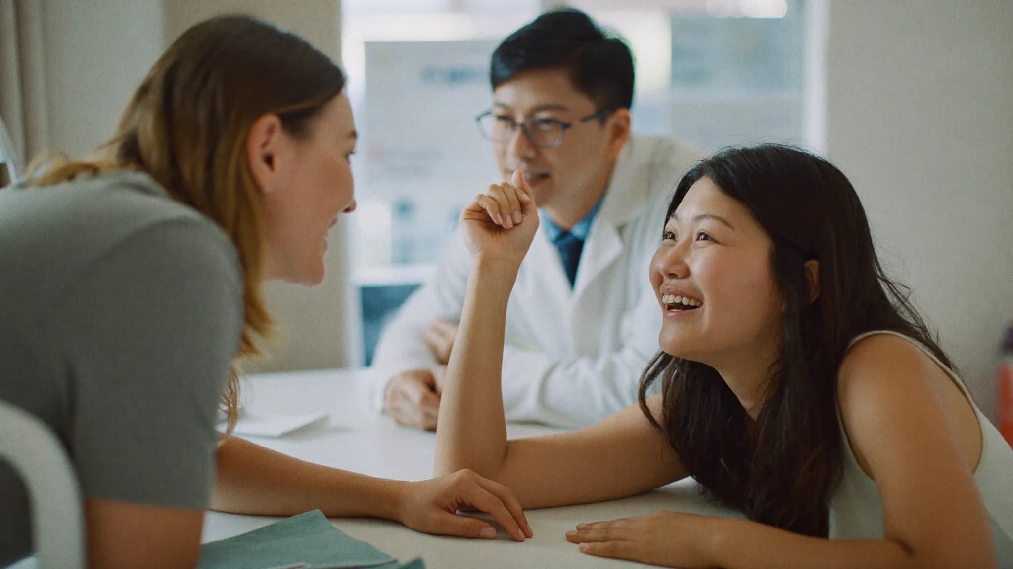 Dentist answering a patient's questions during a consultation at Good Morning Dental